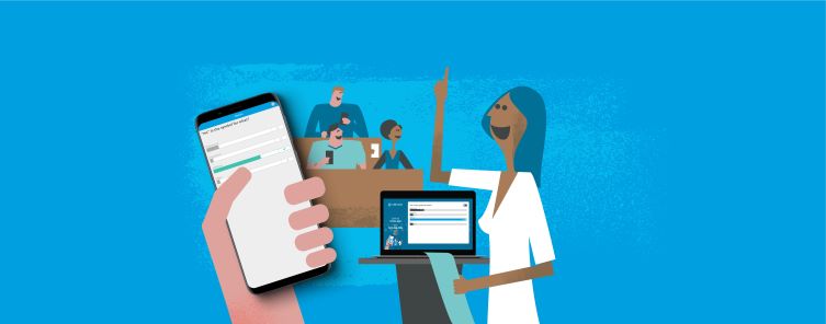 Lecturer with students around them using Vevox on devices